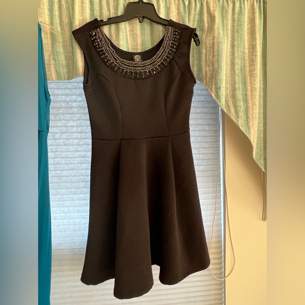 Black dress with beading at neckline